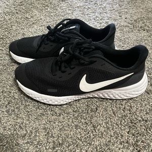 Nike revolution shoes. Youth: 5.5